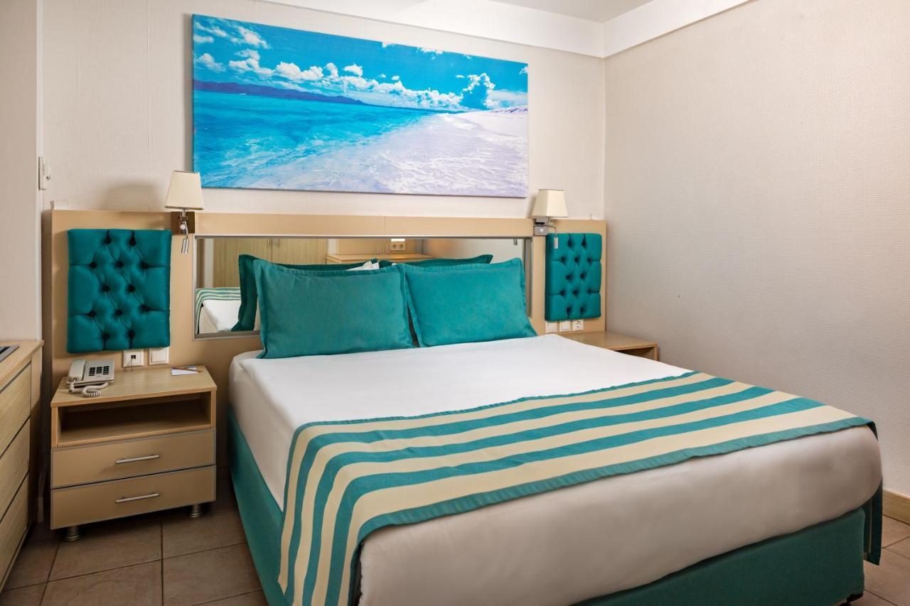 Aqi Hydros Club Hotel Kemer Bagian luar foto A bedroom at the Iberostar Grand Hotel Bávaro