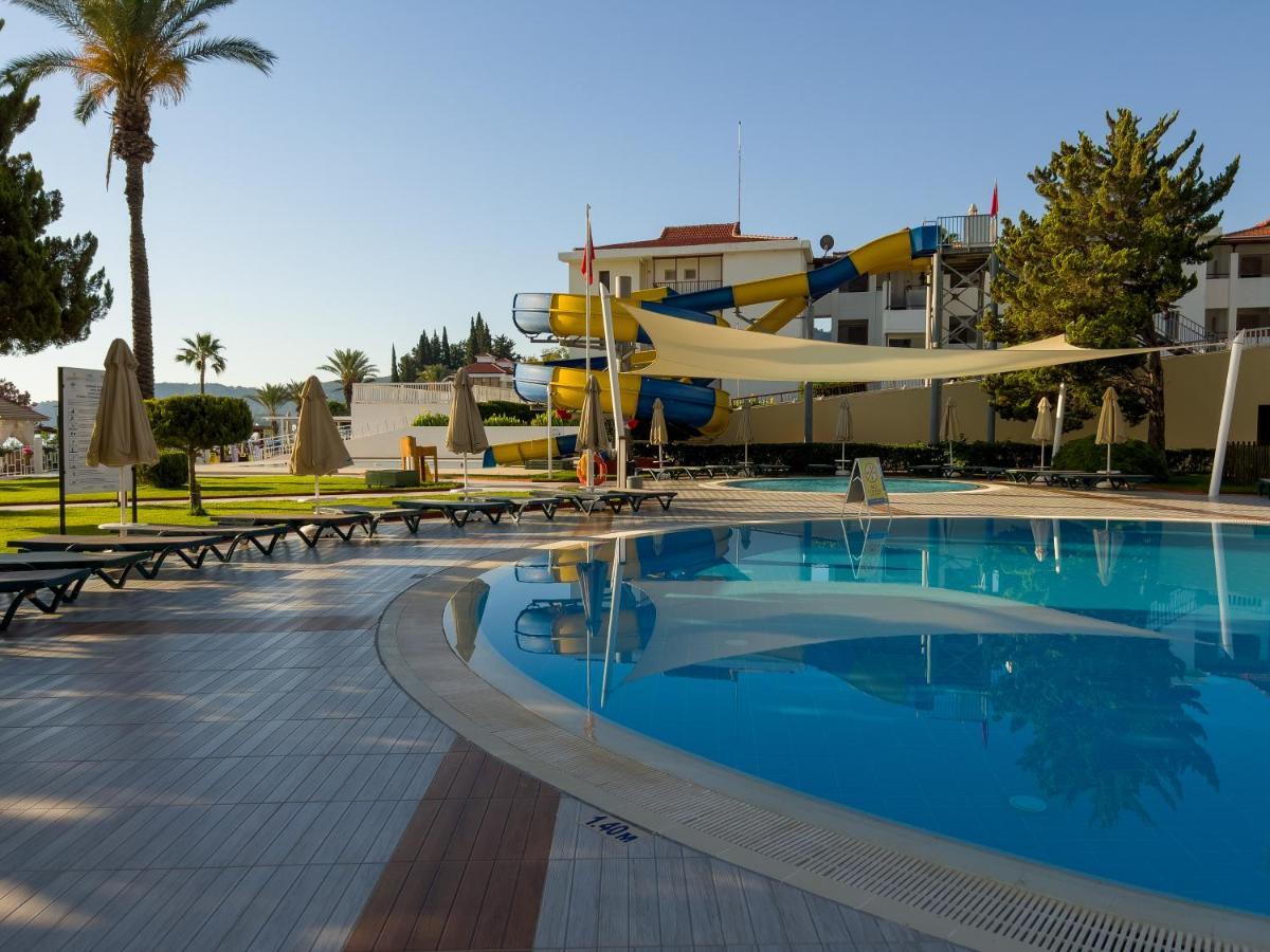 Aqi Hydros Club Hotel Kemer Bagian luar foto A swimming pool at a hotel in Turkey